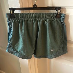 Nike green Dri-Fit athletic shorts.